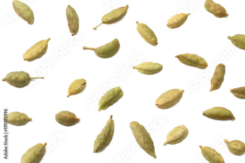Pile of green Cardamom, cardamon or cardamum (dried fruits of Elettaria cardamomum) isolated on white. shadow separated top view