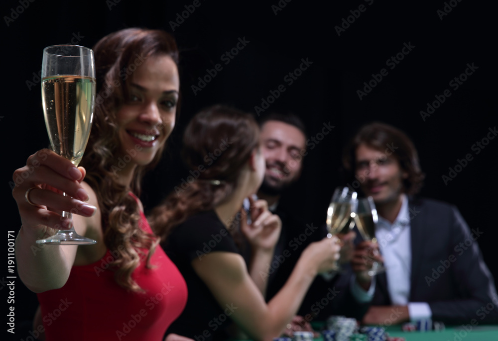 Girl drinking cocktail in casino