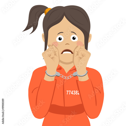 Unhappy american prisoner girl showing handcuffs