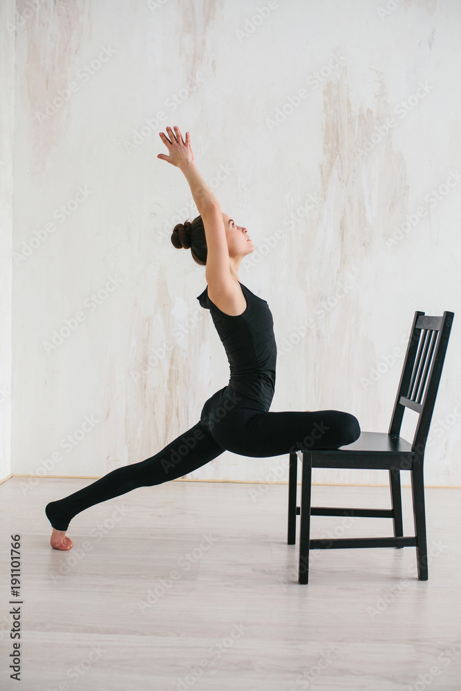 Young beautiful woman practicing yoga and gymnastic. Wellness concept. Classes in single sports.