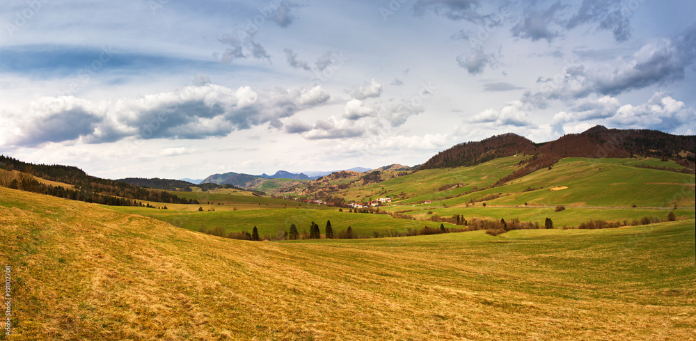 Spring mountain meadow landscape. Panorama of Slovakia Tatras mountains in spring