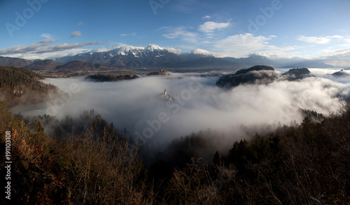 Fototapeta Naklejka Na Ścianę i Meble -  amazing view over lake Bled on a foggy morning from Ojstrica viewpoint, Slovenia, Europe - travel background