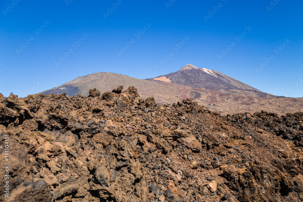 Teide National Park, Tenerife, Canary Islands - A picturesque view of the colourful Teide volcano, or in spanish 'Pico del Teide'. The tallest peak in Spain with an elevation of 3718 m Teide National Park, Tenerife, Canary Islands - A picturesque view of the colourful Teide volcano, or in spanish 'Pico del Teide'. The tallest peak in Spain with an elevation of 3718 m