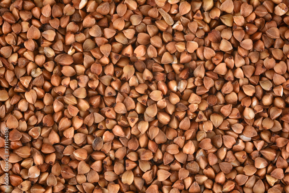 Buckwheat groats background. Buckwheat texture. Buckwheat groats background. Buckwheat texture.