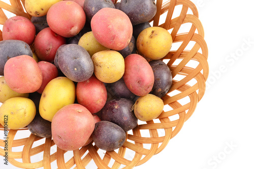 Fotografi Tricolor mini potatoes in basket