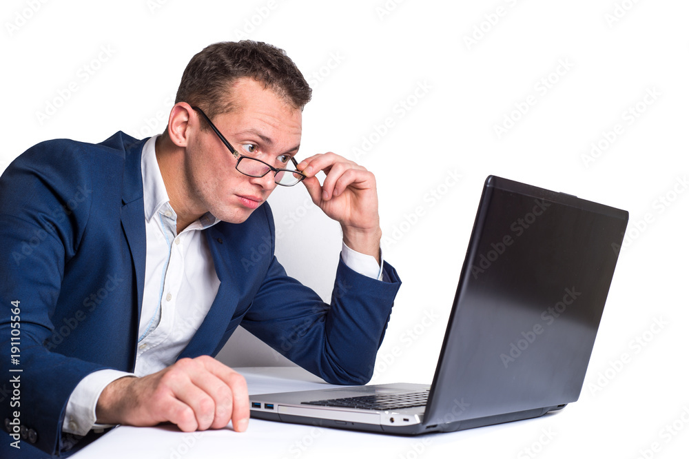 Young man working at computer on white background Young man working at computer on white background