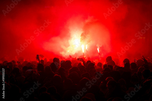 football fans lit up the lights and smoke bombs. revolution. protest