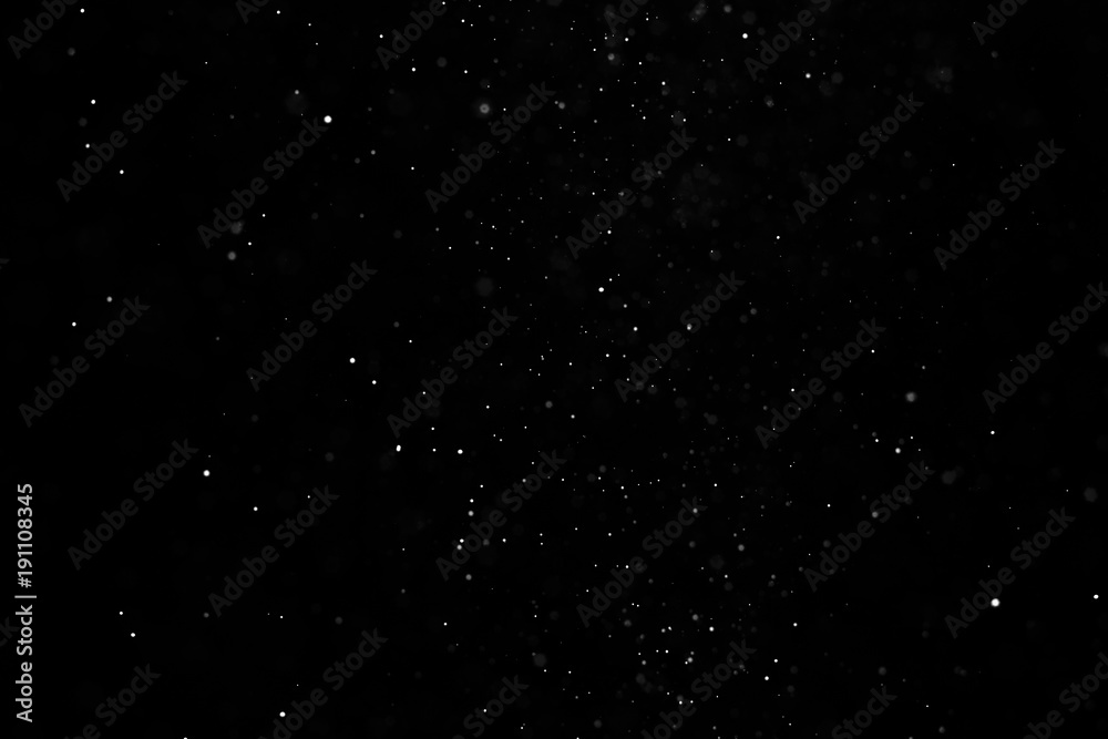 The texture of the snow on a black background The texture of the snow on a black background