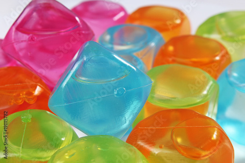 Colorful plastic ice cubes. Ice cubes as background.