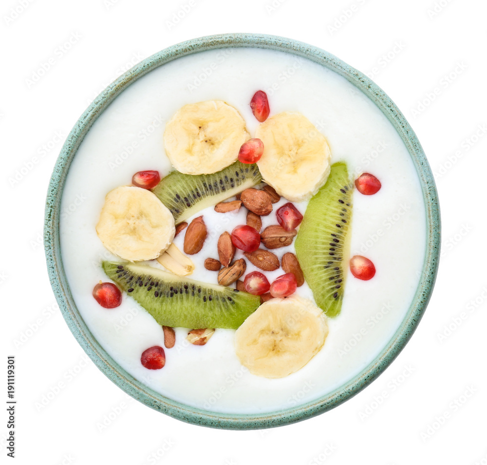 Yogurt with banana, pomegranate seeds and kiwi in dish on white background Yogurt with banana, pomegranate seeds and kiwi in dish on white background
