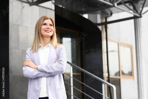 Business owner near building, outdoors Free Download Business owner near building, outdoors - GFXLoad