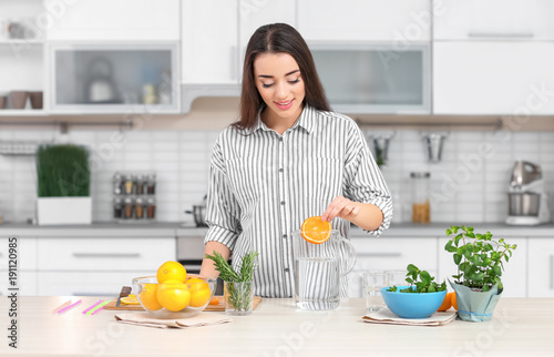 Young woman preparing tasty...