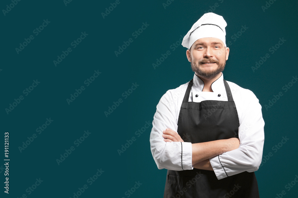 Handsome male chef on color background Handsome male chef on color background
