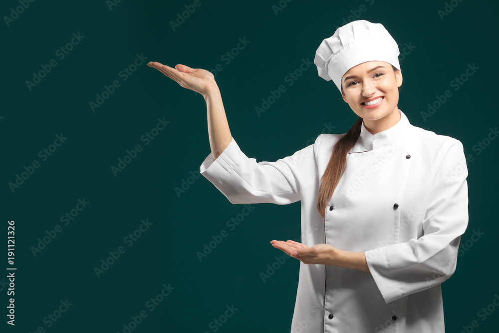 Beautiful female chef on color background Beautiful female chef on color background