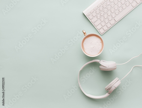Soft Pastel Styled Desk Scenes With Headphones, coffee and keyboard