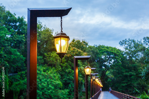 Lamp Posts on  Bridge at Dusk in Public Parden photo