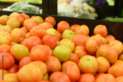 Stack orange tomatoes 