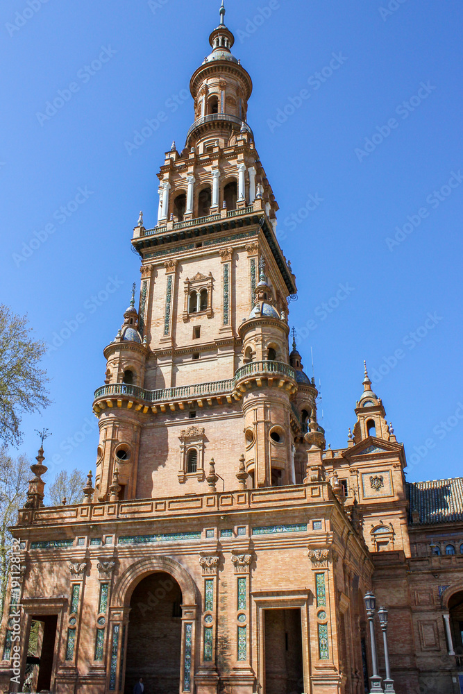 The stunning Tower on Plaza de Espana, in Seville, Spain captured on a warm spring  afternoon
