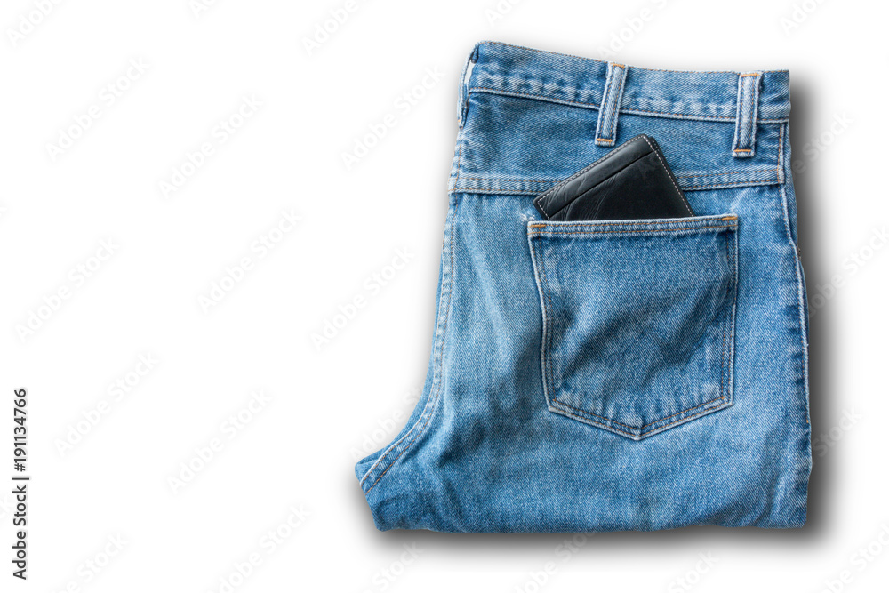 black wallet in the pocket of blue jeans