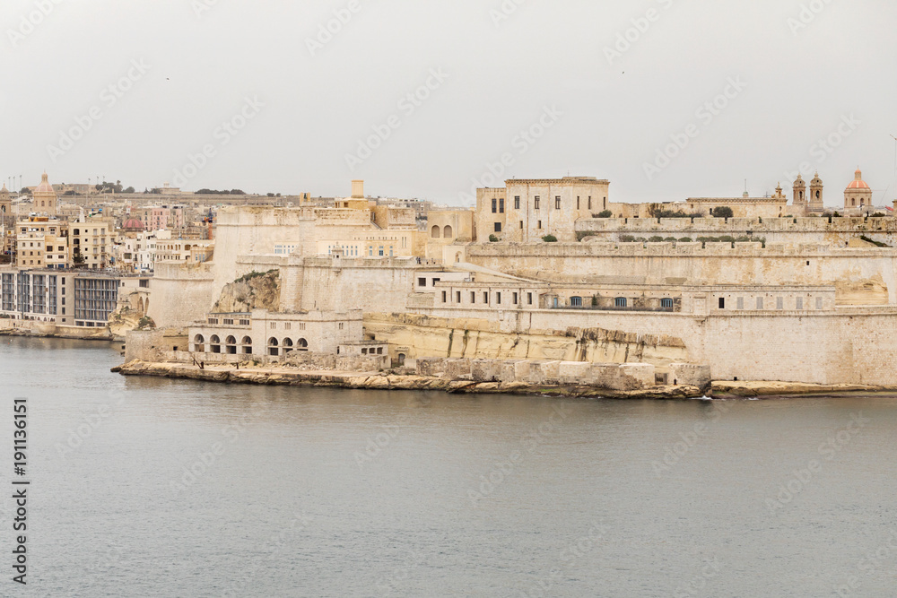 Saint Angelo castle and surroundings seen from Lower Barrakka Gardens, Valletta, Malta