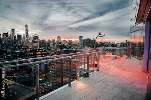 Luxury city rooftop balcony with chilling area in New York City Manhattan midtown. Elite real estate concept.