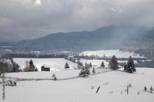 winter in the mountains - small Romanian village in the Carpathians covered with snow © Melinda Nagy