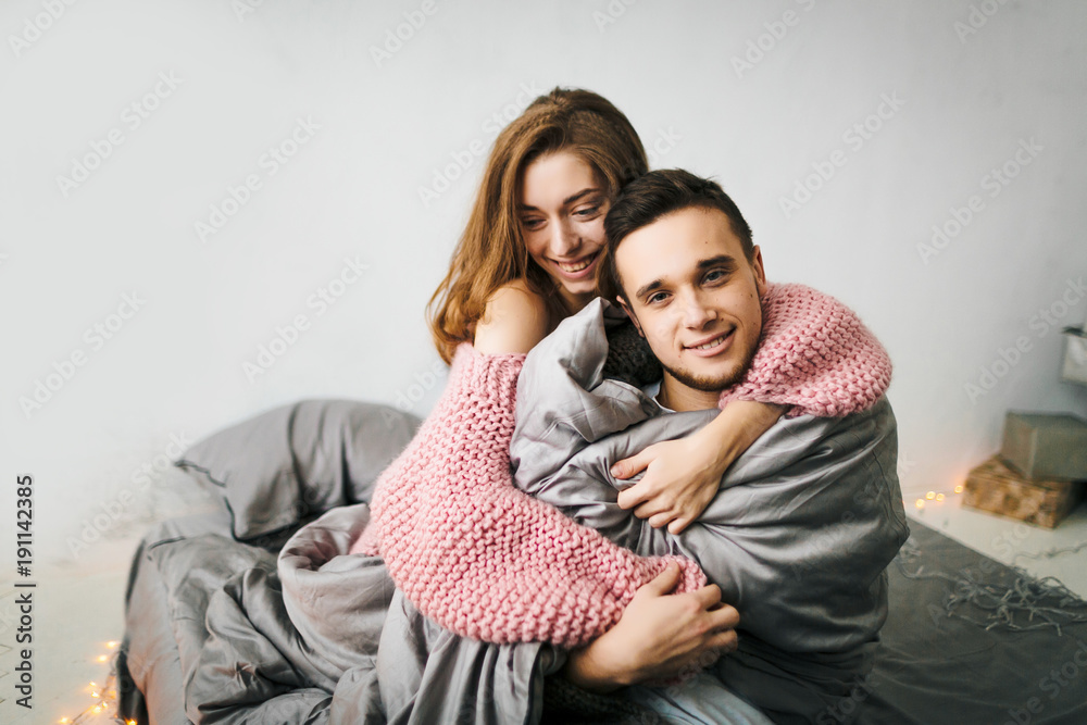 A couple in love having fun in the bed. Artwork. Soft focus A couple in love having fun in the bed. Artwork. Soft focus