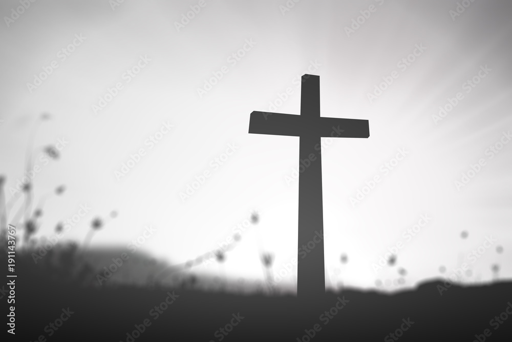 Good friday concept: Black and white cross over blurred nature background