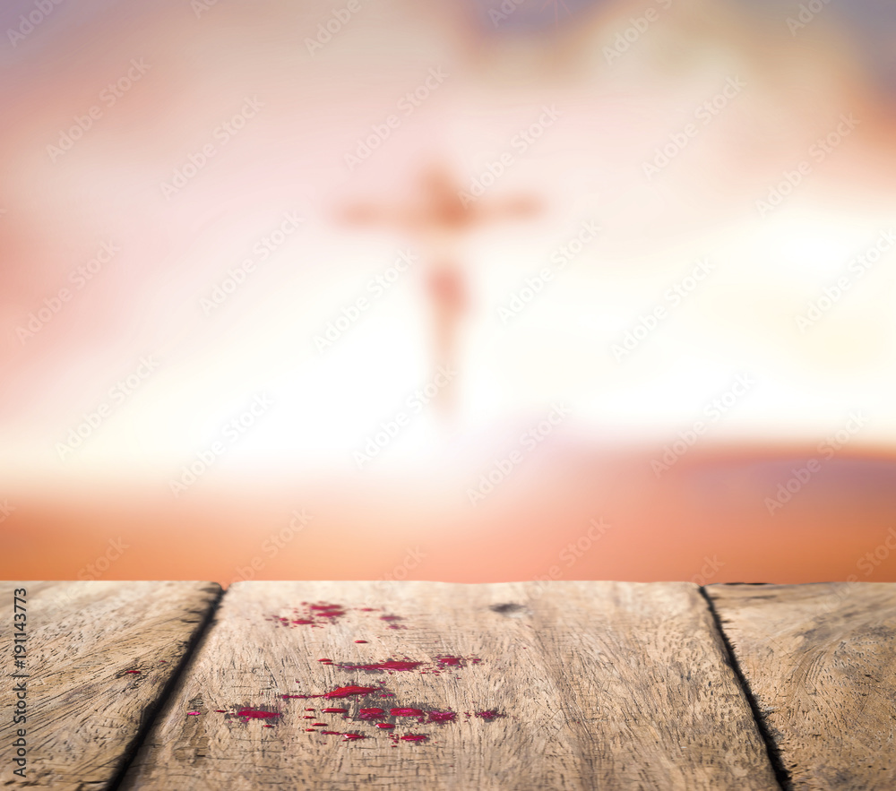 Good Friday concept: Blood on wood and blurred Jesus Christ on the cross  sunset background Stock Photo | Adobe Stock