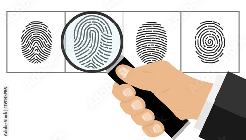 The hand with the magnifying glass looks at the fingerprint. The detective looks at the fingerprint.