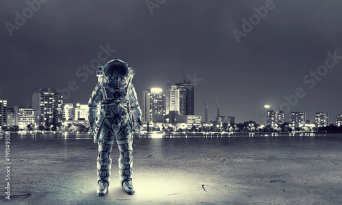 Astronaut standing outdoor. Mixed media