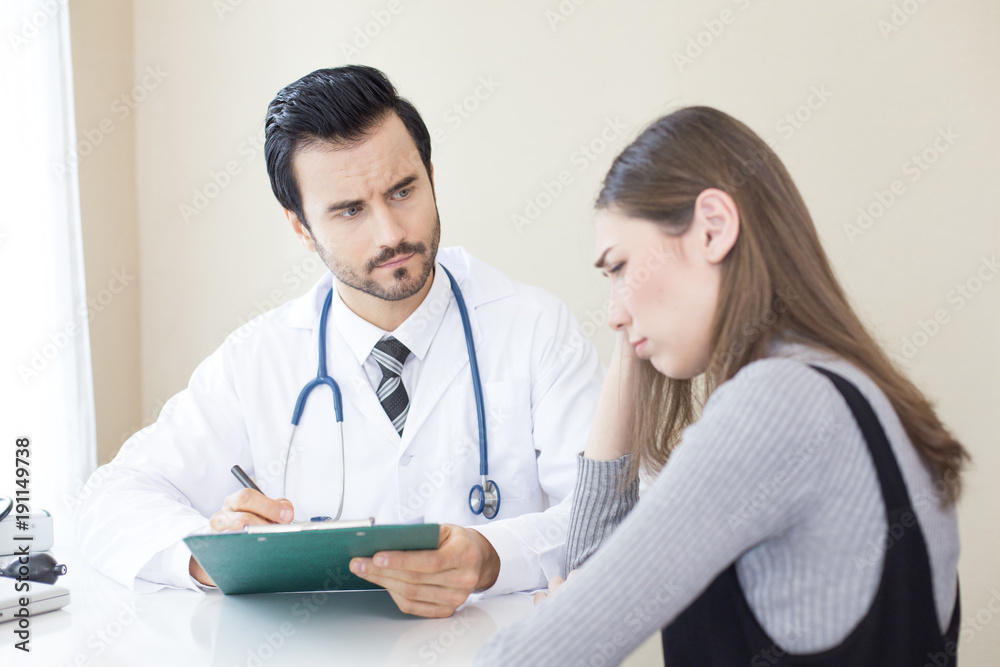 Doctor checking detail for treat patient at clinic. People with medical concept. Doctor checking detail for treat patient at clinic. People with medical concept.