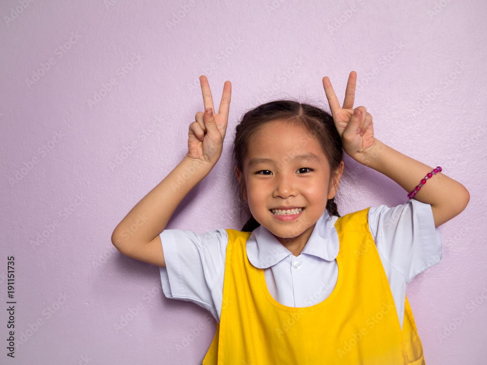 Portrait of Asian happy little girl , smile, school uniform Portrait of Asian happy little girl , smile, school uniform