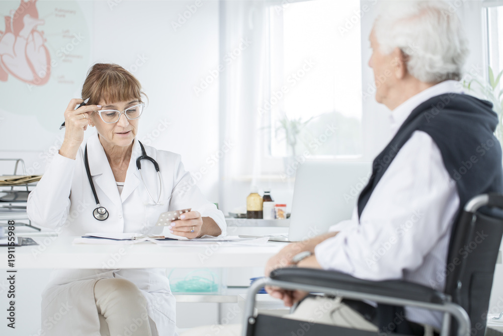 Doctor explaining medicine taking Doctor explaining medicine taking