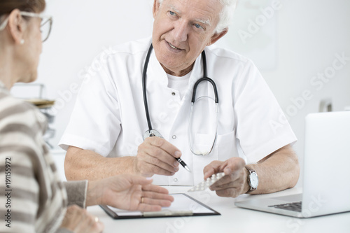 Doctor showing medicine