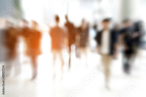 Abstract zoom blur people walking