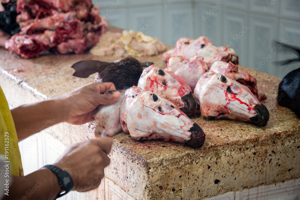 Goat heads for sale at Darajani Market in Stone Town, Zanzibar