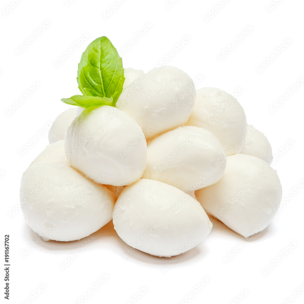 Traditional Italian Mozzarella cheese and basil on white background Traditional Italian Mozzarella cheese and basil on white background