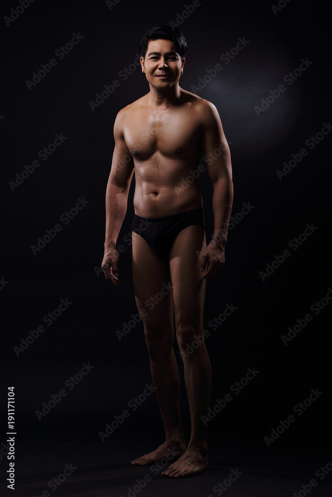 Portrait of an athletic Asian Man, black and white photo Portrait of an athletic Asian Man, black and white photo
