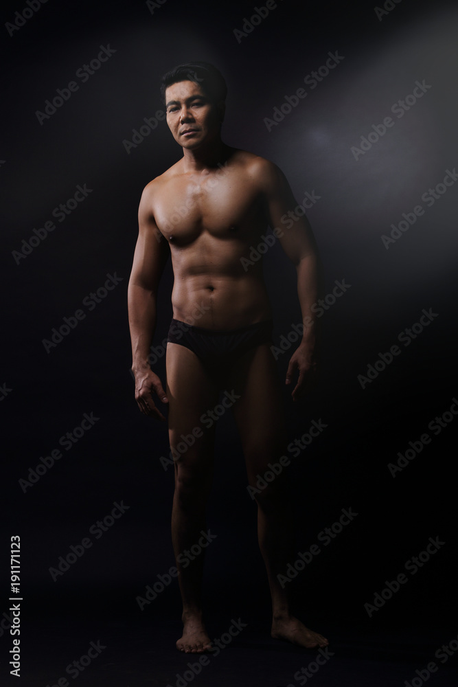 Portrait of an athletic Asian Man, black and white photo Portrait of an athletic Asian Man, black and white photo