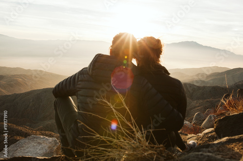 Couple overlooking palm springs from keys view in joshua tree national park
