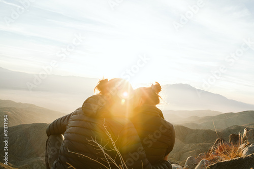 Couple overlooking palm springs from keys view in joshua tree national park