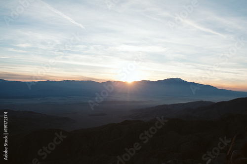 Couple overlooking palm springs from keys view in joshua tree national park © Casey