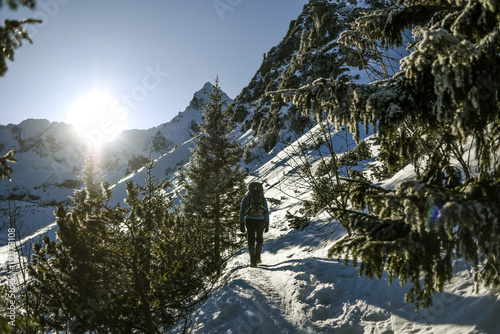 Man in mountains. Winter mountain landscape, Tatra mountains in Poland.