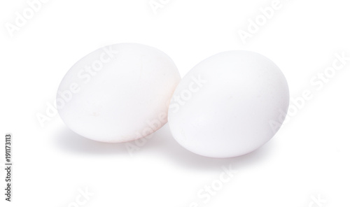 Group of two white eggs isolated on white background