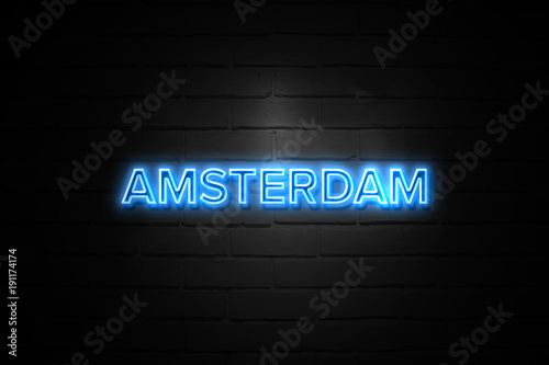 Photography Amsterdam neon Sign on brickwall
