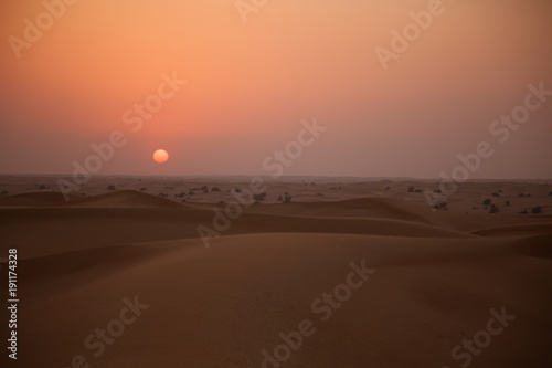 Dunes right at sunset in a desert near Dubai