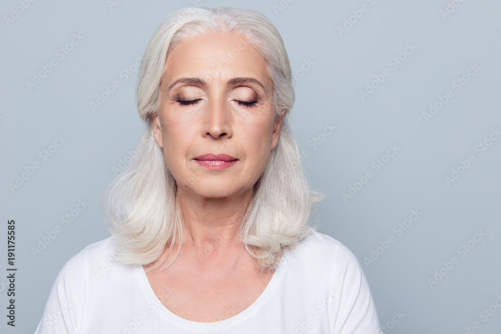 Close Up Portrait Of Confident Concentrated Mature Woman With Wrinkles