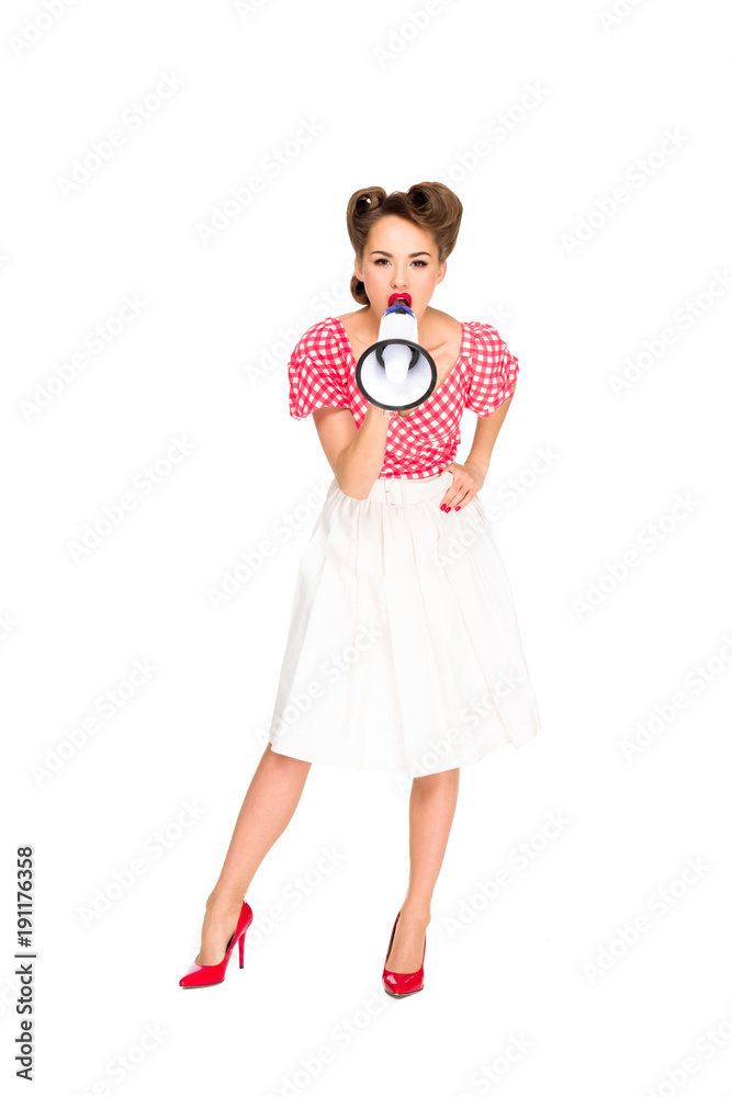 fashionable young woman in pin up style clothing screaming into loudspeaker isolated on white fashionable young woman in pin up style clothing screaming into loudspeaker isolated on white