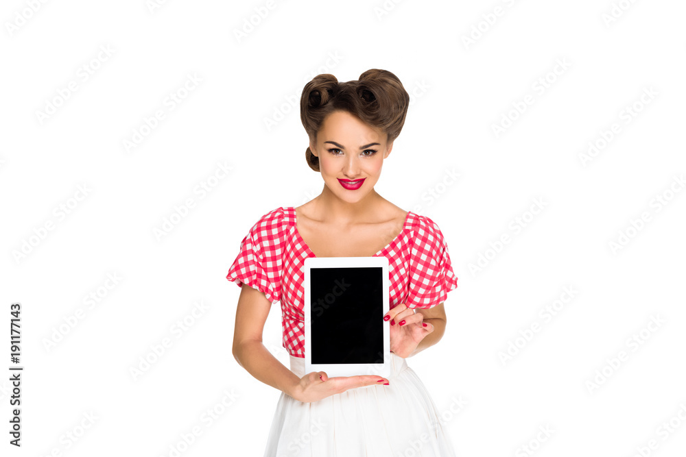 portrait of smiling woman in pin up style clothing showing tablet isolated on white portrait of smiling woman in pin up style clothing showing tablet isolated on white